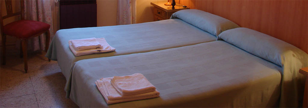 detalle habitación apartamentos Júcar